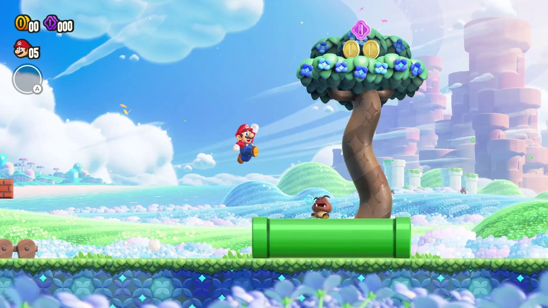 alt: Ảnh gameplay Super Mario Bros. Wonder với Mario và các nhân vật 3D trên màn hình, di chuyển trên mặt phẳng 2D, minh họa rõ nét thể loại platformer 2.5D hiện đại.