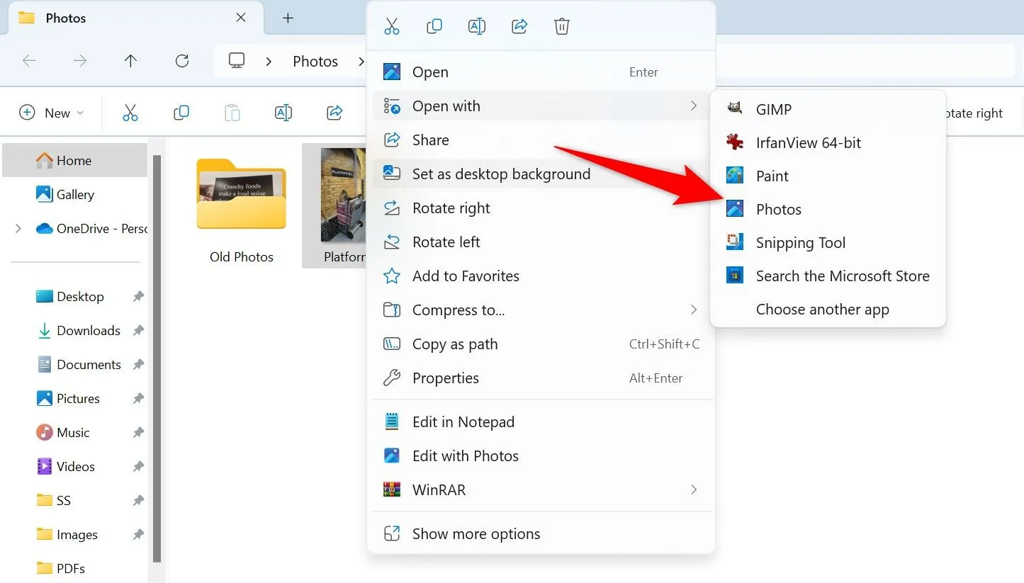 Ảnh chụp màn hình File Explorer hiển thị menu chuột phải của một tệp ảnh, với tùy chọn &quot;Open With&quot; và &quot;Photos&quot; được đánh dấu để mở ảnh trong ứng dụng Photos.