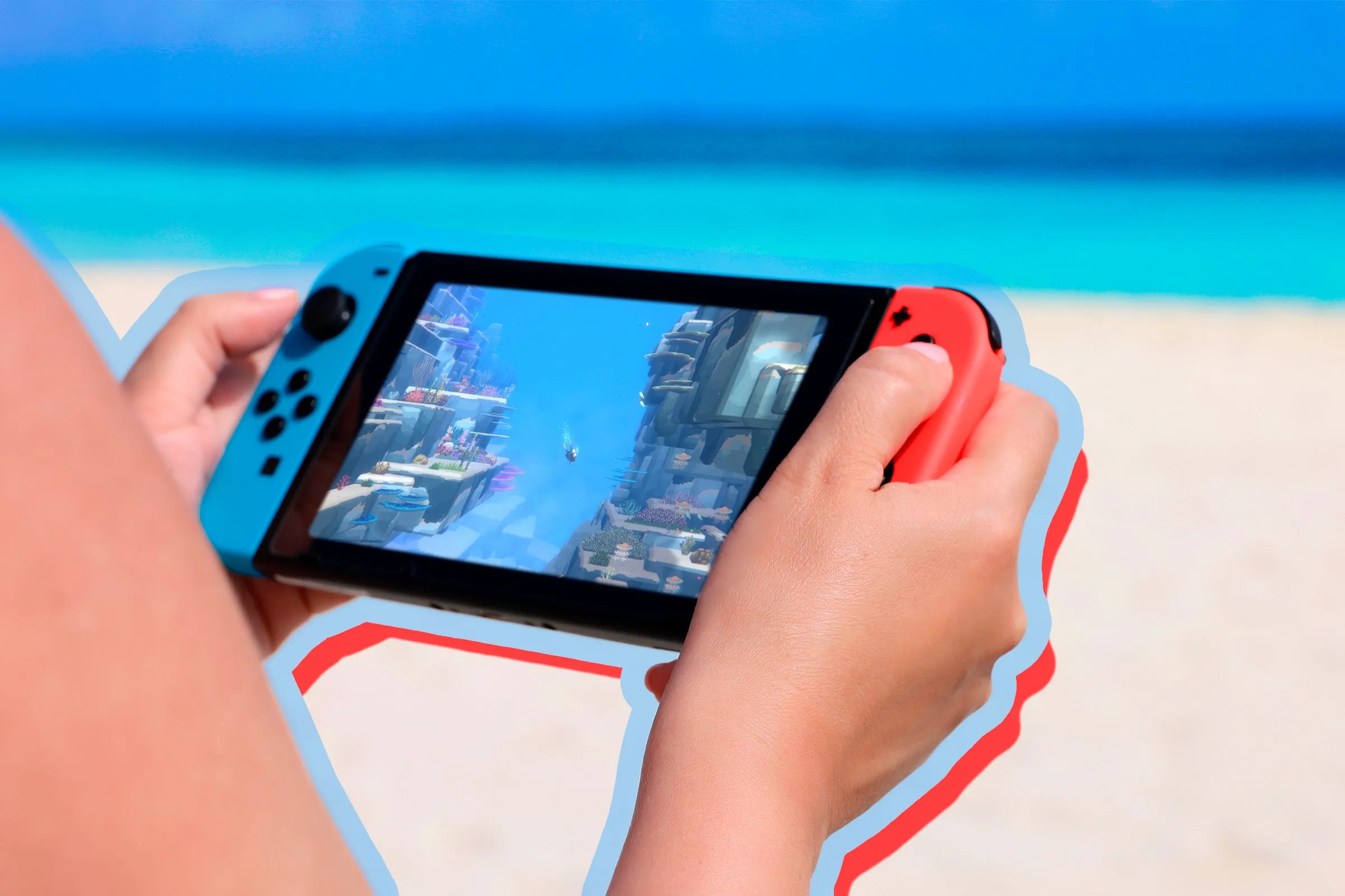 Người đang chơi game trên Nintendo Switch tại bãi biển