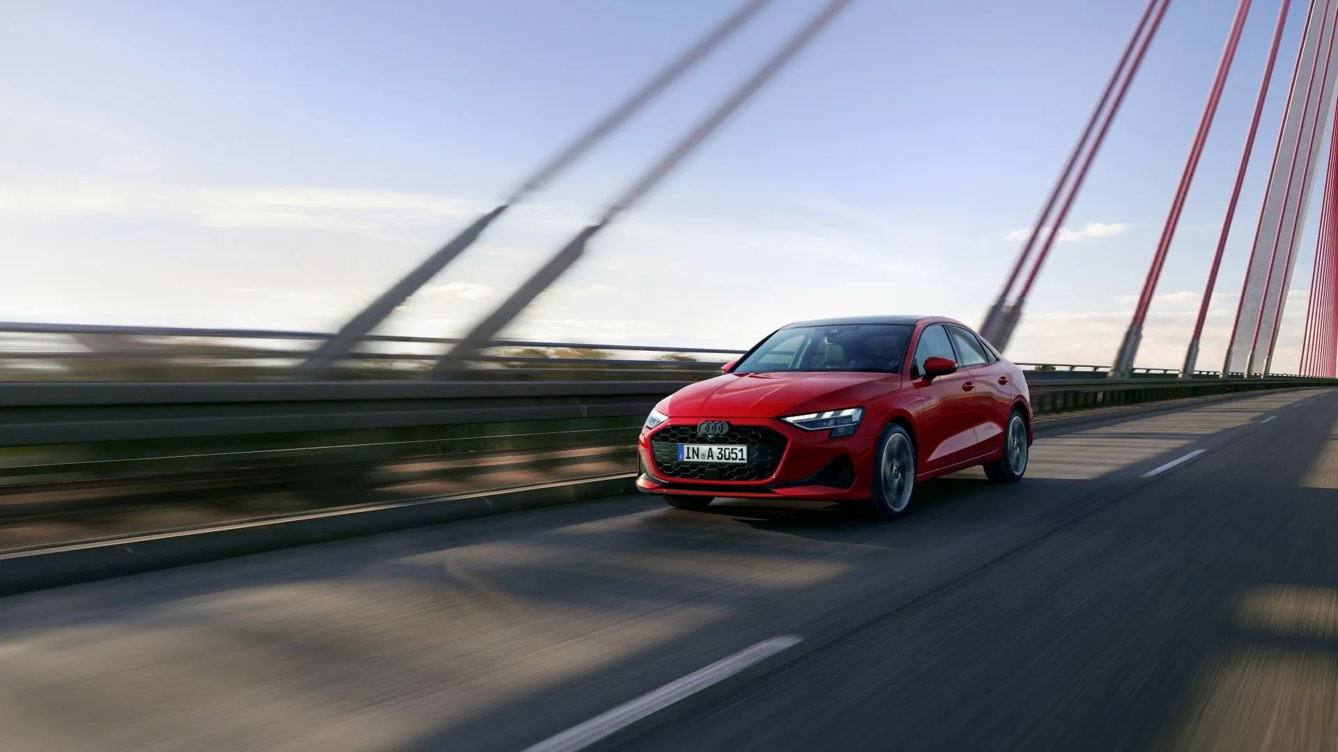 Audi A3 2025 màu đen đang lướt trên đường, thể hiện sự năng động của mẫu xe sedan hạng sang Đức