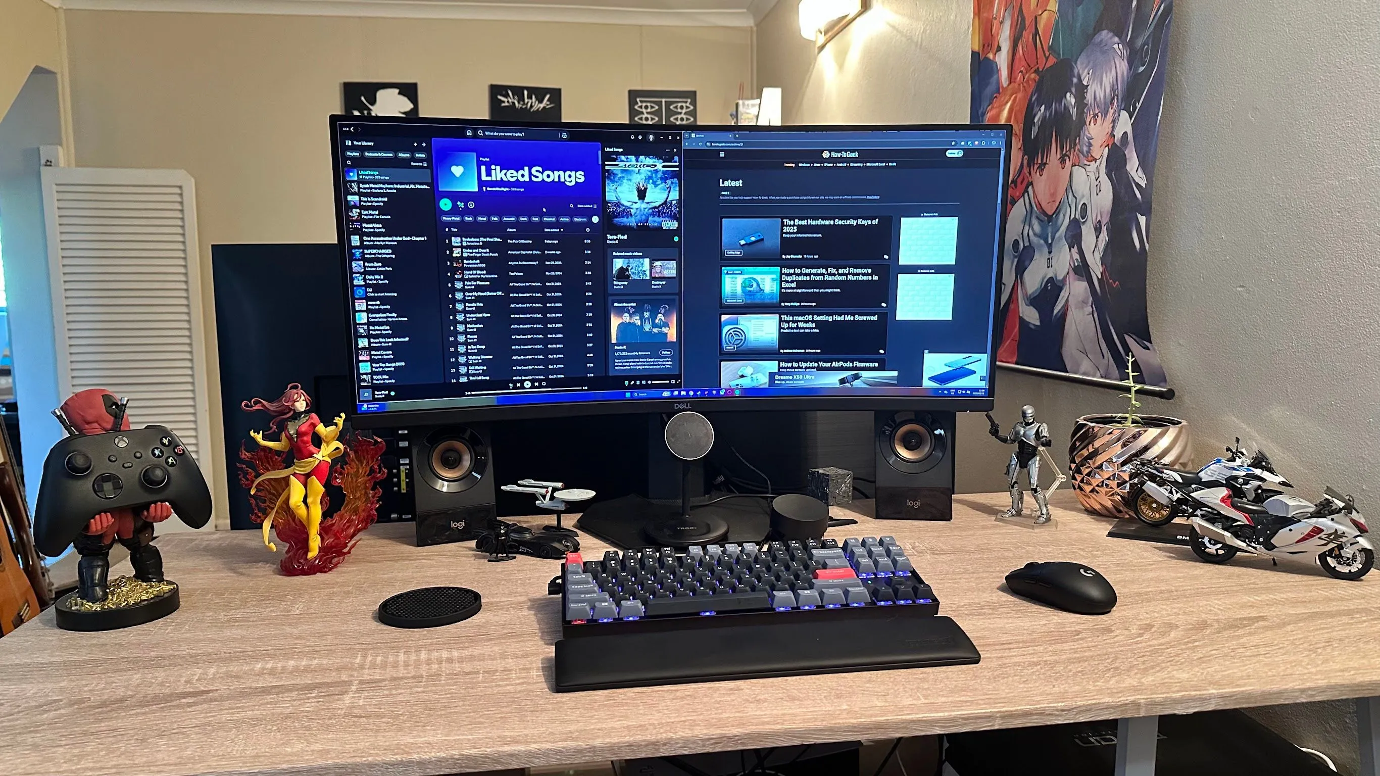 Bàn làm việc với màn hình ultrawide hiển thị nhiều ứng dụng và cửa sổ PiP của Safari