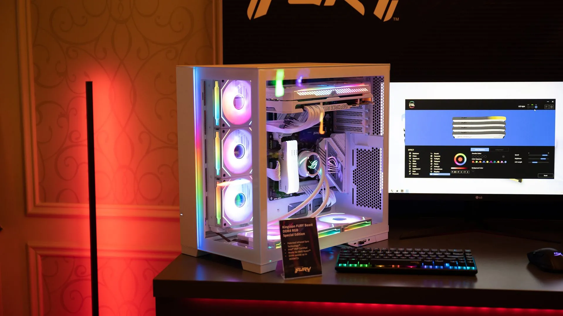 Bên trong một case máy tính gaming với bộ nhớ Kingston, quạt RGB, tản nhiệt CPU MSI và card đồ họa GeForce RTX, tất cả đều được chiếu sáng.