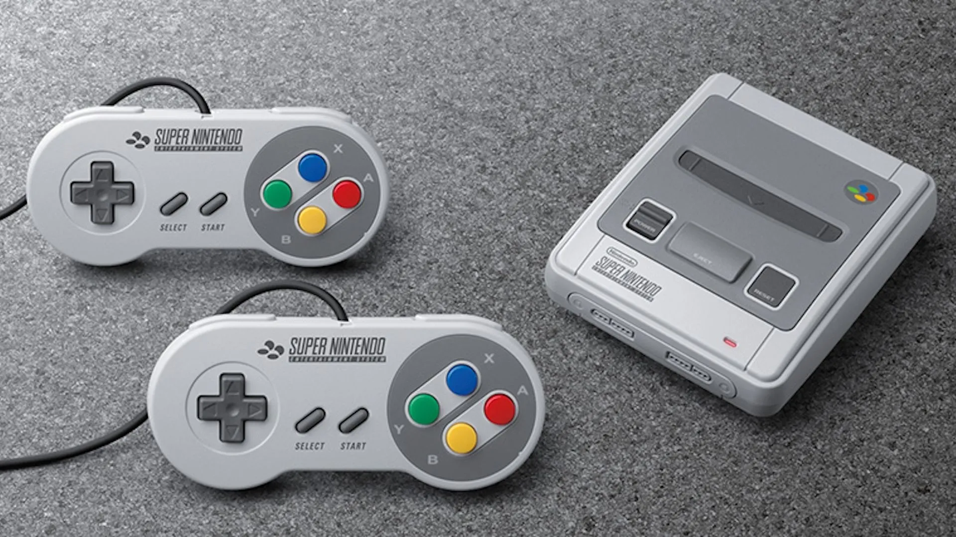 Bộ đôi máy NES Classic và SNES Classic với hai tay cầm được đặt trên thảm nhà, gợi nhớ không gian chơi game retro.