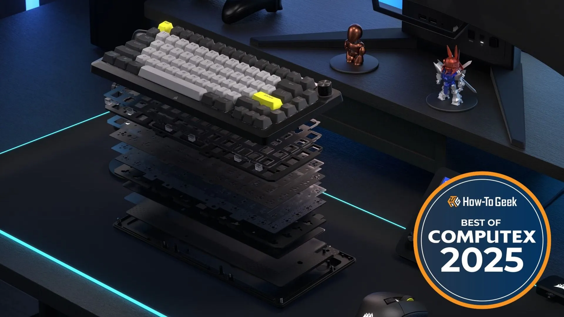 Bộ kit bàn phím Corsair MAKR 75 dạng barebones phô diễn các lớp cấu tạo bên trong trên một mặt bàn làm việc, khuyến khích sự tùy chỉnh.