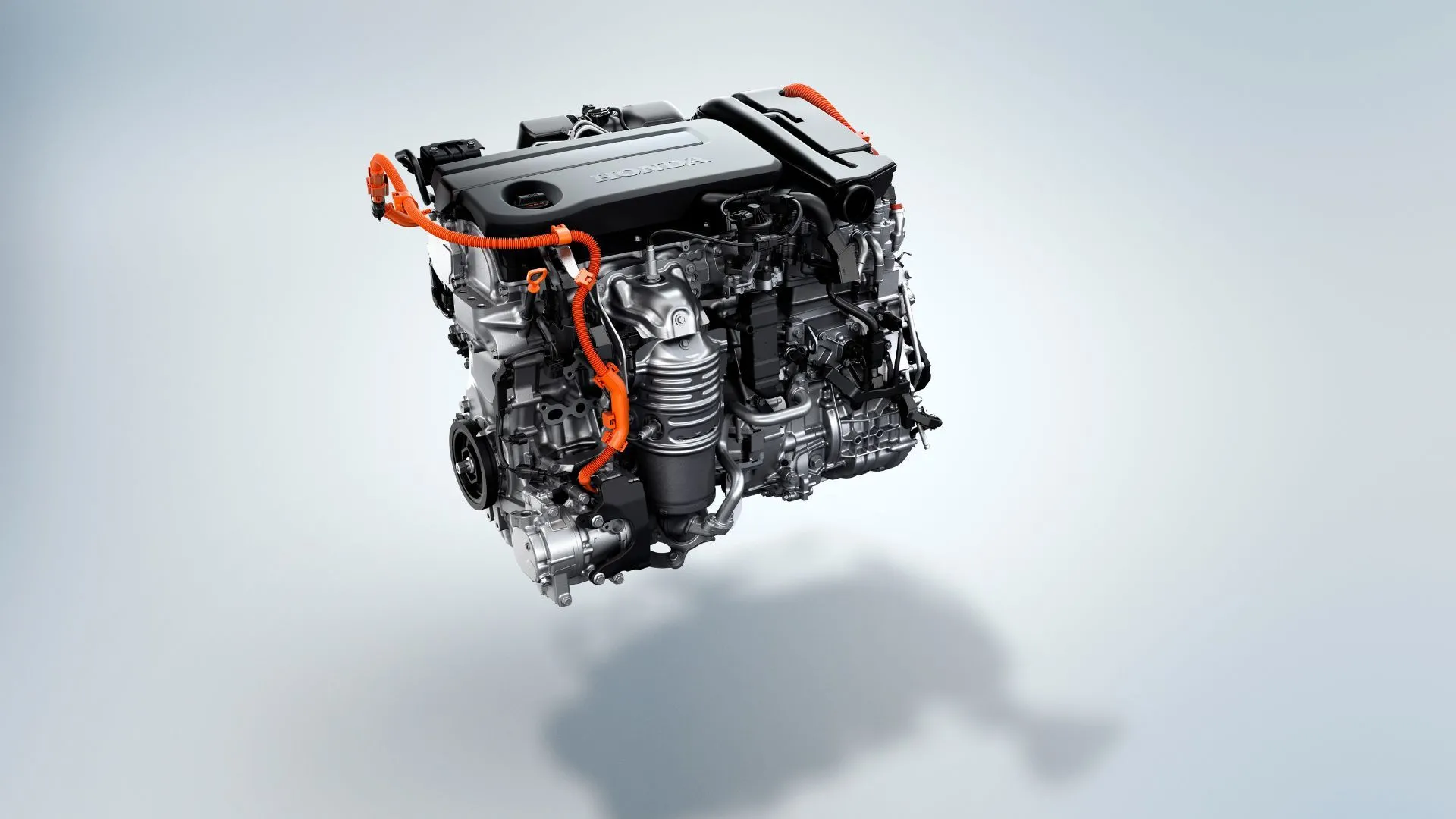 Cận cảnh hệ truyền động hybrid của Honda Accord 2023, minh họa sự kết hợp động cơ xăng Atkinson-cycle 2.0L và hai mô tơ điện