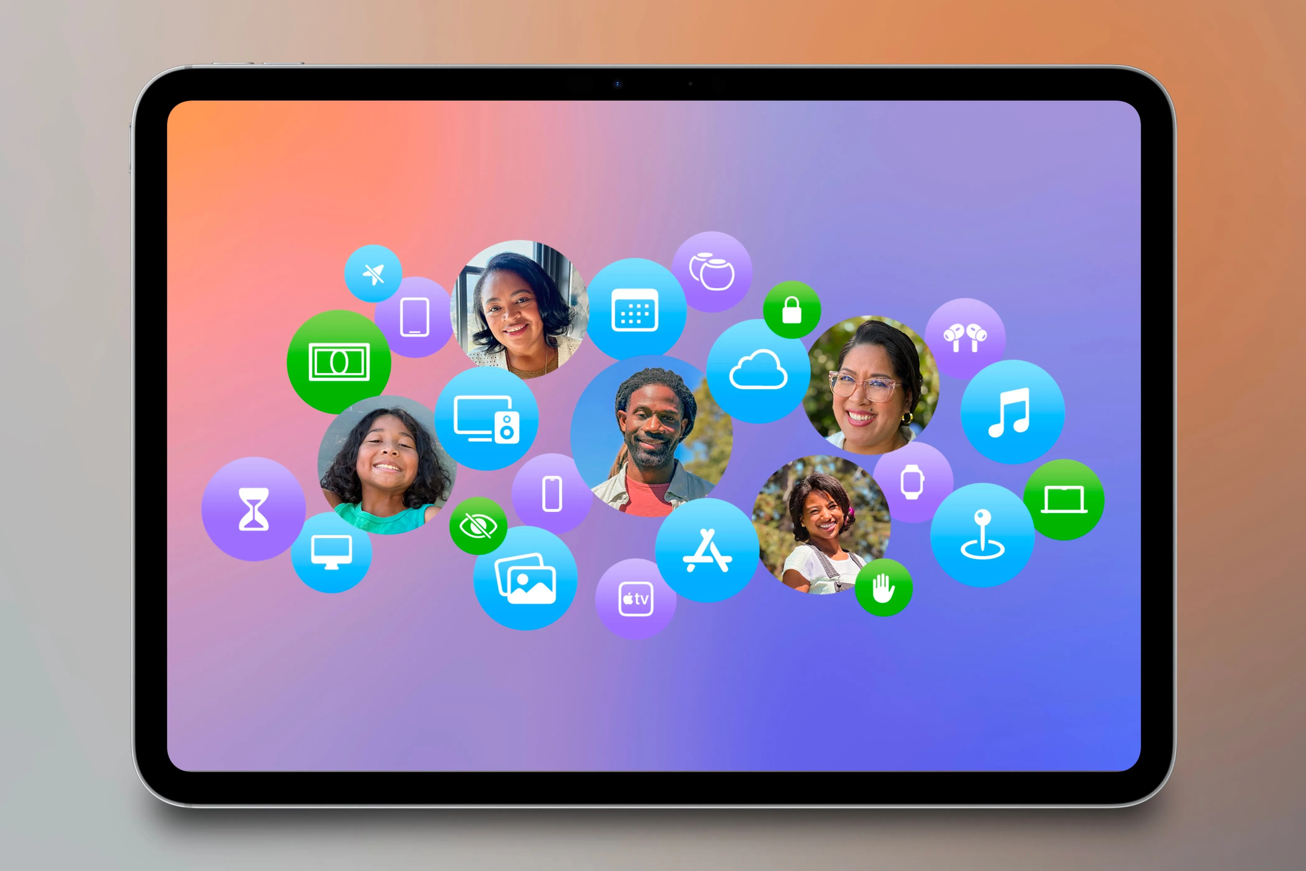 Family Sharing icons showcased on an iPad in front of a colorful background.