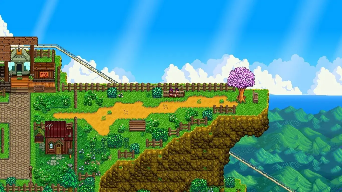 Hai nhân vật Stardew Valley ngồi trên quảng trường đỉnh núi, có thể đi lên bằng cáp treo, khám phá ngôi làng mới Ridgeside Village.