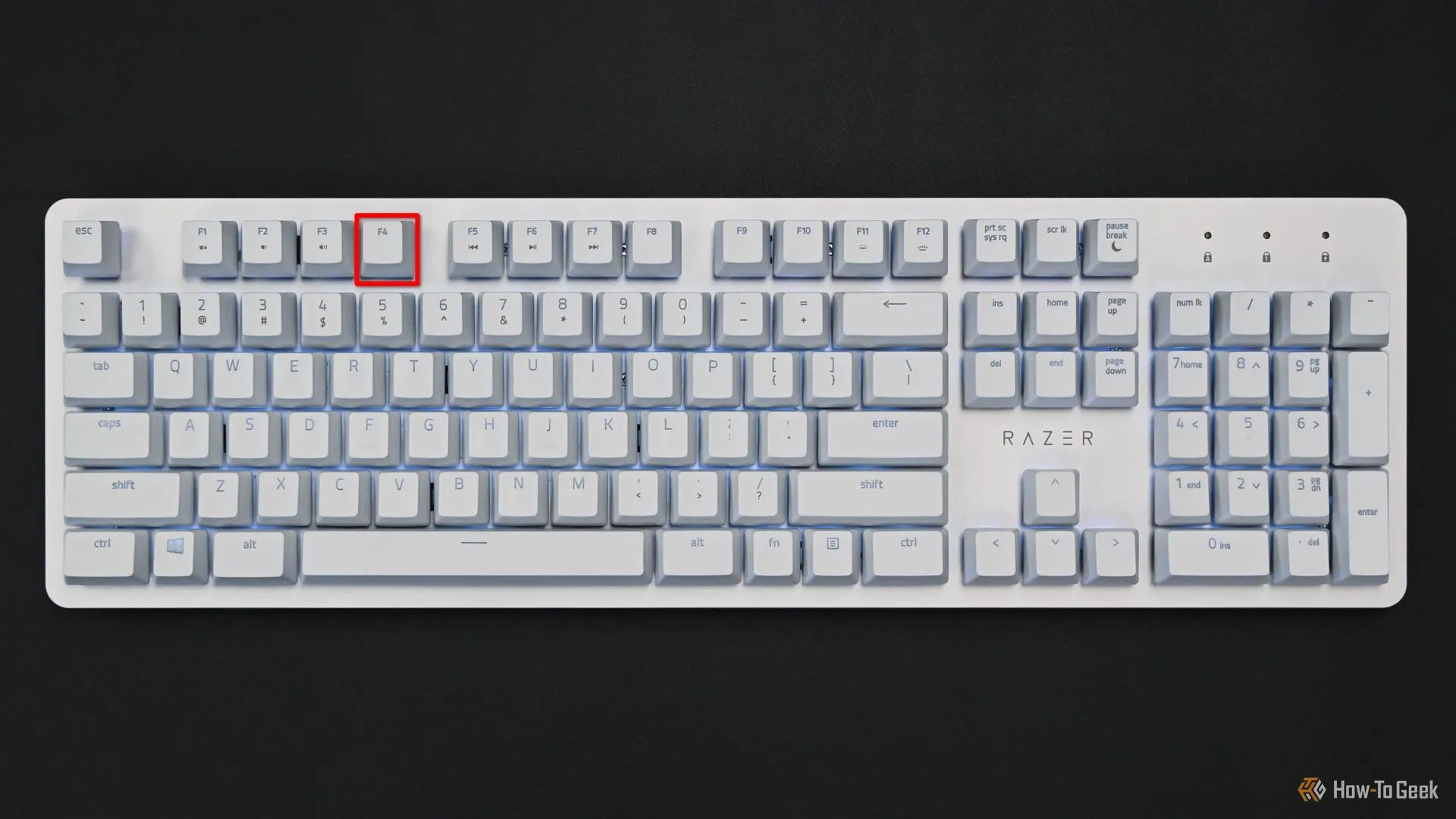 Hình ảnh bàn phím với phím F4 được viền đỏ, thể hiện phím tắt để mở terminal tích hợp trong trình quản lý tệp Dolphin của KDE Plasma.