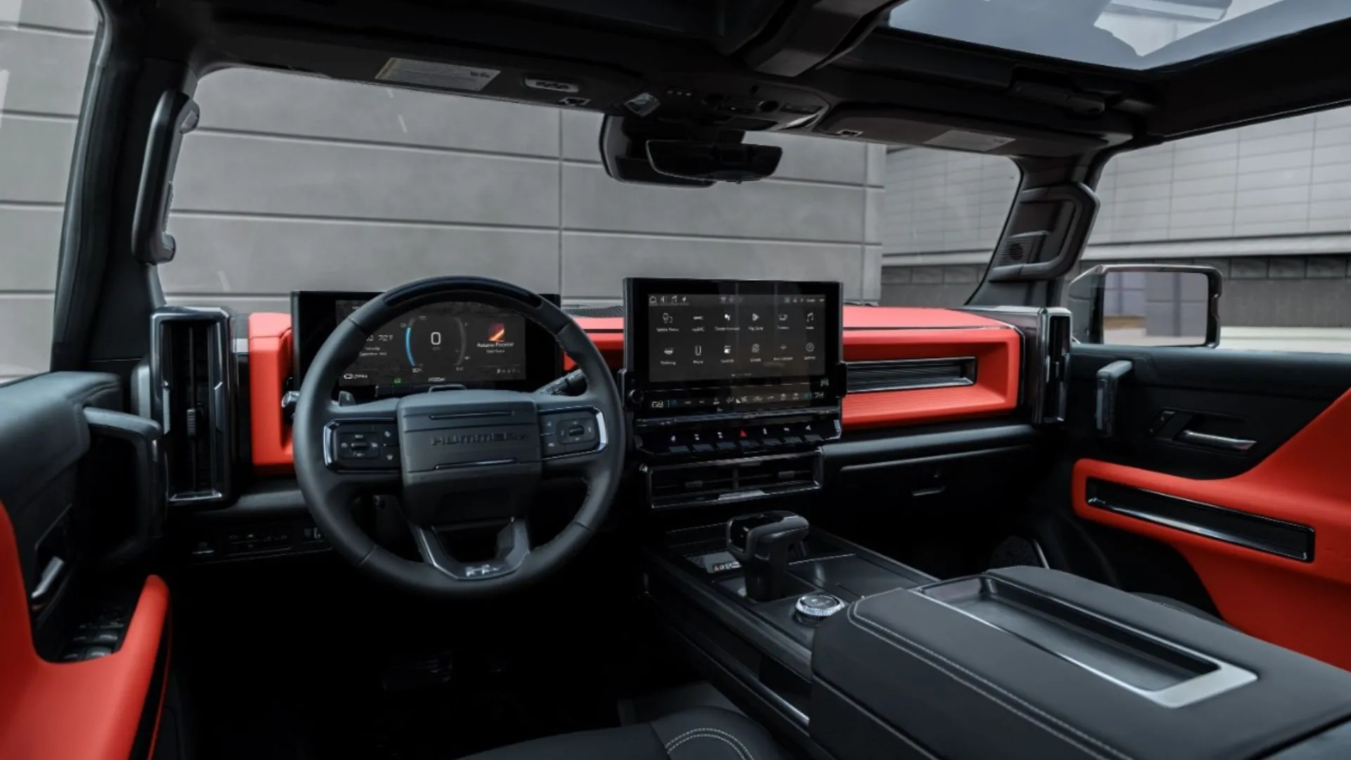 Hình ảnh nội thất bên trong chiếc GMC Hummer EV SUV, tập trung vào khoang lái và ghế hành khách.