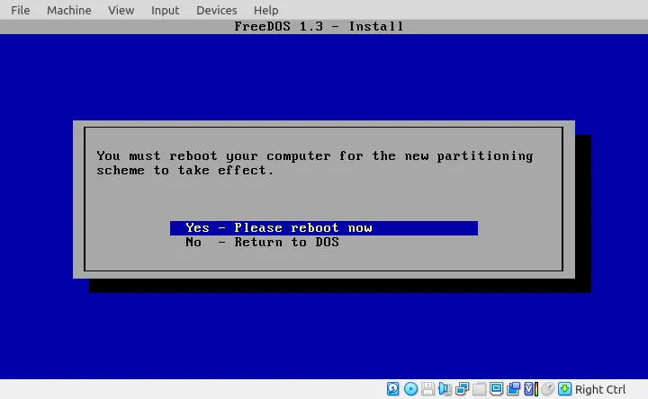 Màn hình nhắc nhở khởi động lại FreeDOS sau khi cài đặt hoàn tất
