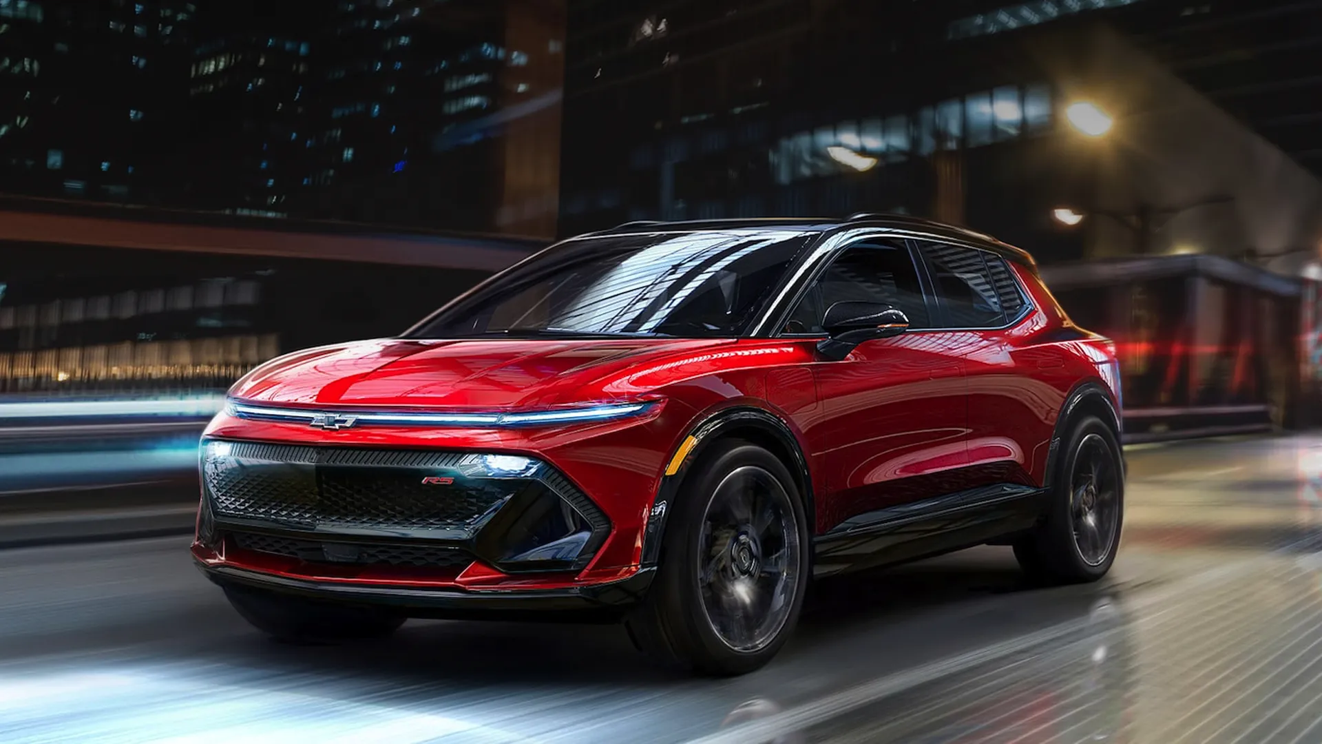 Mẫu xe SUV điện Chevrolet Equinox EV màu đỏ nổi bật với thiết kế hiện đại và năng động.