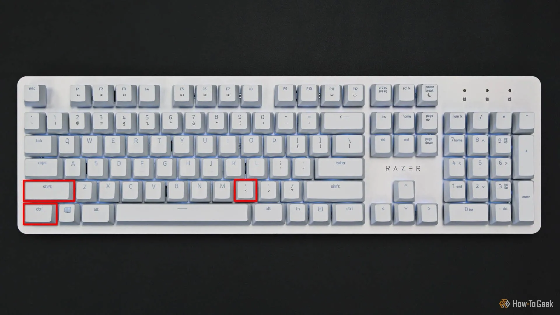 Minh họa bàn phím với các phím Ctrl, Shift và dấu phẩy được đánh dấu đỏ, biểu thị phím tắt để mở cài đặt ứng dụng KDE Plasma.