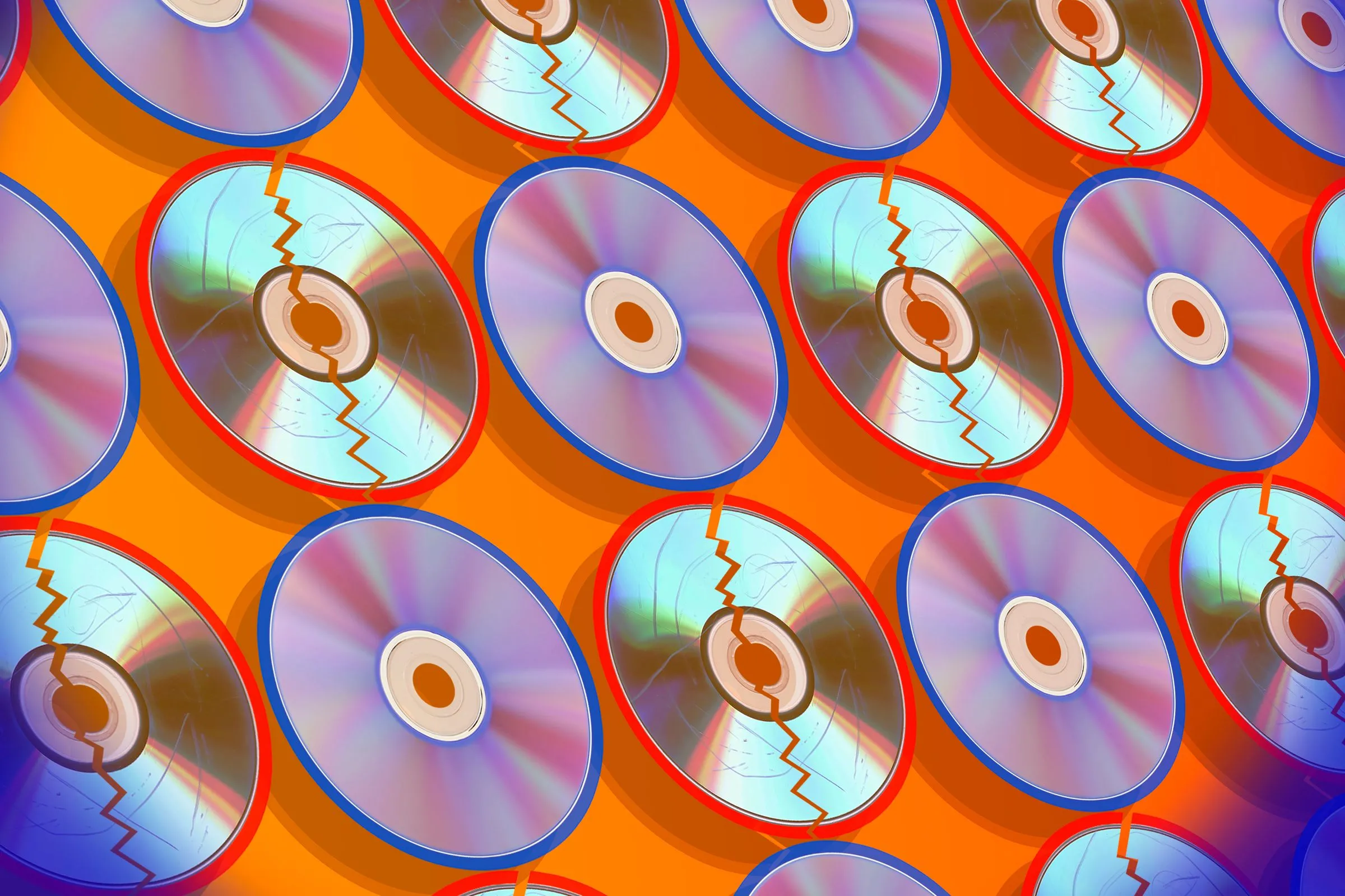 Một nhóm các đĩa DVD và Blu-ray cạnh nhau, một số đĩa bị hư hỏng do 'mục nát'.