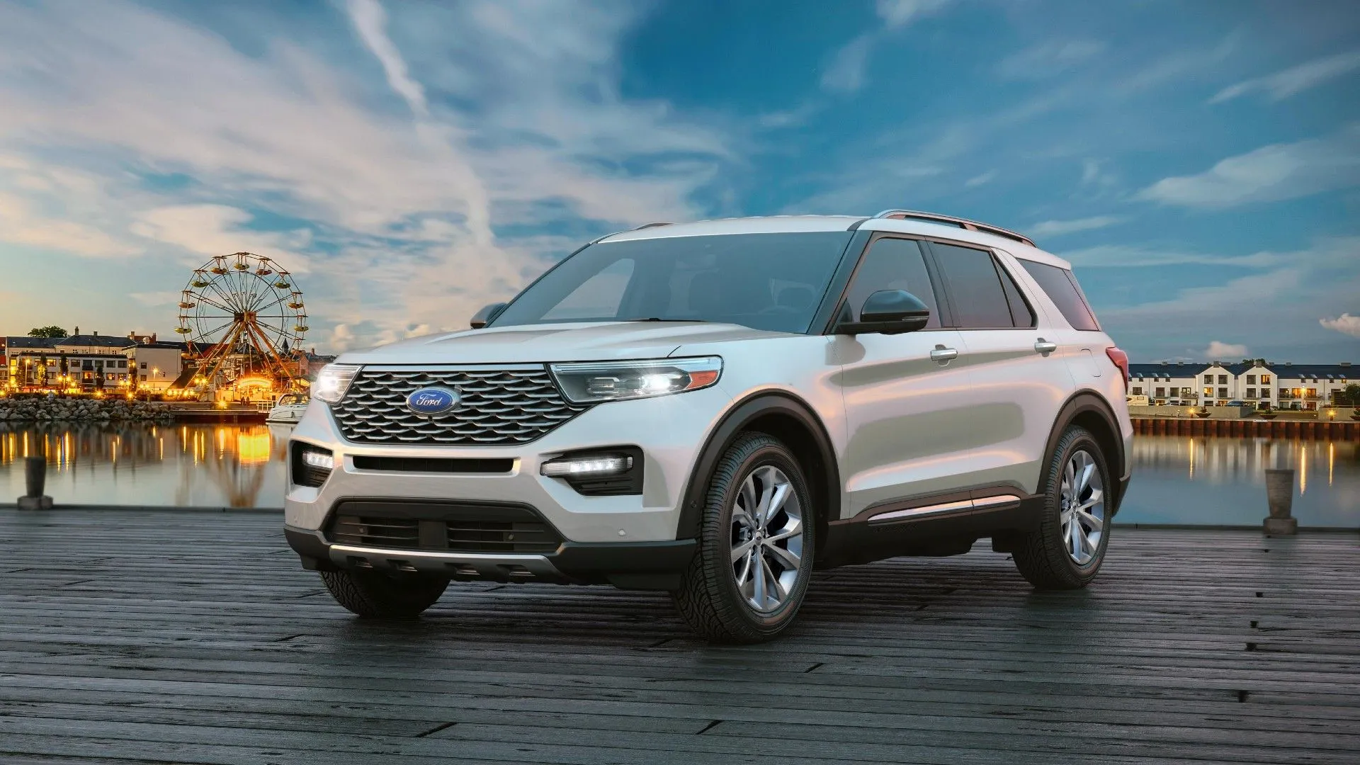 Xe SUV Ford Explorer 2024 màu xanh đen đỗ trên bến tàu, thể hiện vẻ ngoài mạnh mẽ và hiện đại.