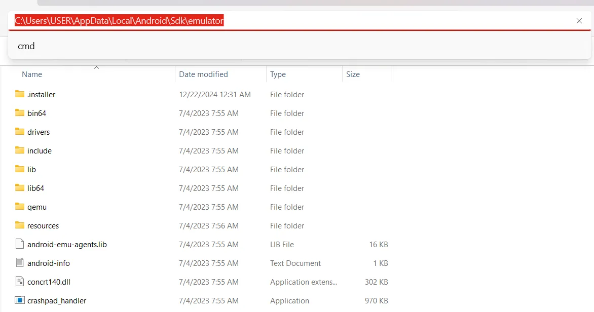 Cửa sổ File Explorer đang mở thư mục emulator của Android SDK, với thanh địa chỉ hiển thị &quot;cmd&quot; để mở Command Prompt tại vị trí này.