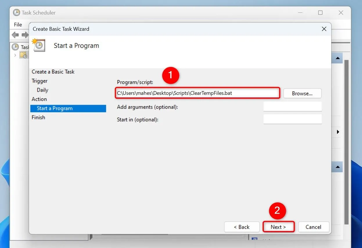 Chỉ định đường dẫn đến file script ClearTempFiles.bat trong Task Scheduler để thực thi tác vụ